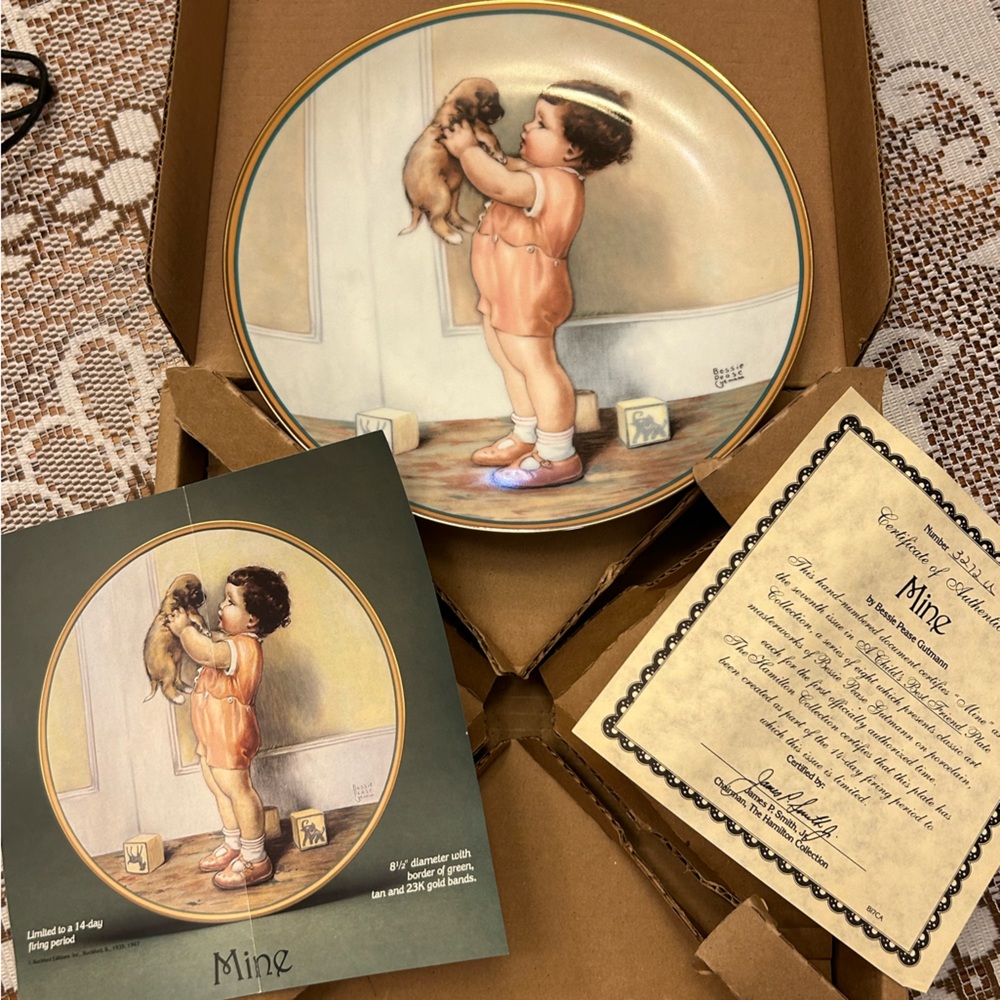 Child holding Puppy Mine art Bessie Pease Gutmann a “child’s best friend plate”